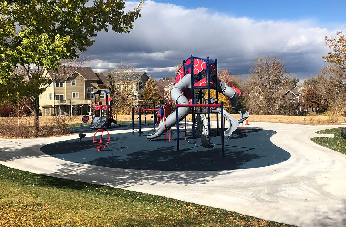 All ages playground equipment for younger and older kids at Centennial Ridge Park